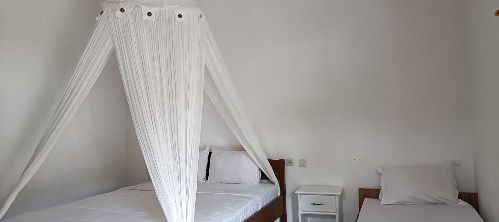 Moon In Hotel เคลิมูตู ภายนอก รูปภาพ